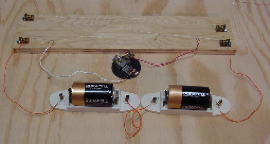 nichrome wire, light bulb, and battery circuit - different