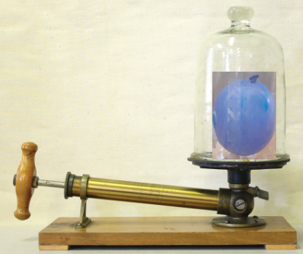 Balloon in bell jar with air pump